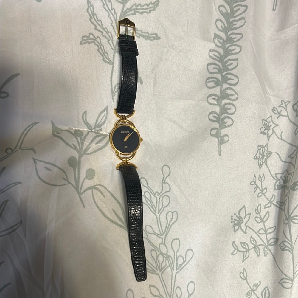Vintage Gucci Black and Gold Leather Strap Watch